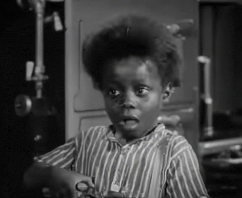 Young Boy In Striped Shirt With A GIF