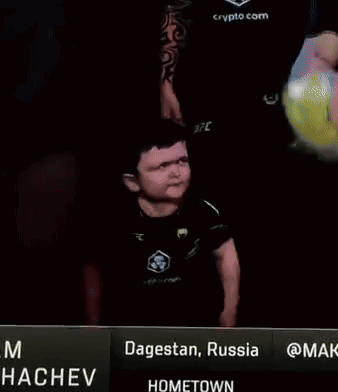 Young Boy In UFC Shirt At Dagestan Russia Hometown Sign GIF