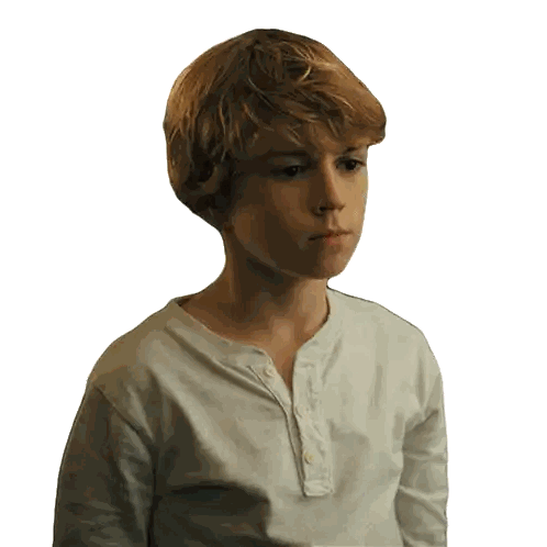 Young Boy in White Shirt Looking Sideways
