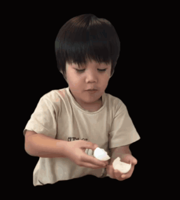 Young Boy in White Shirt