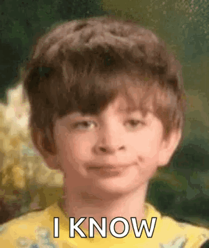 Young Boy in Yellow Shirt Making Funny Face