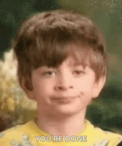Young Boy in Yellow Shirt Smiling