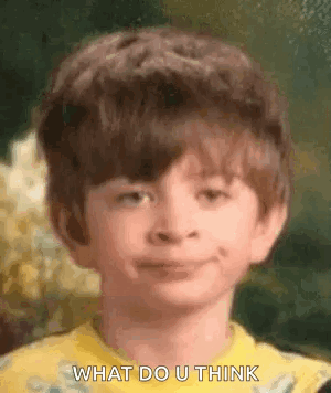 Young Boy In Yellow Shirt Smiling Making Face GIF