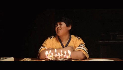 Young Boy In Yellow Shirt With Birthday Cake GIF