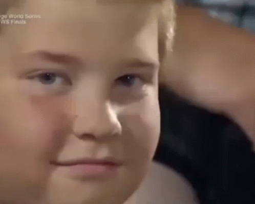 Young Boy Making Funny Face in Stadium