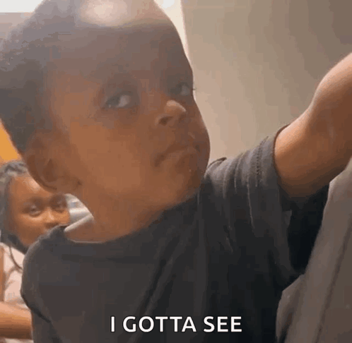 Young Boy Making Funny Face Saying I Gotta See