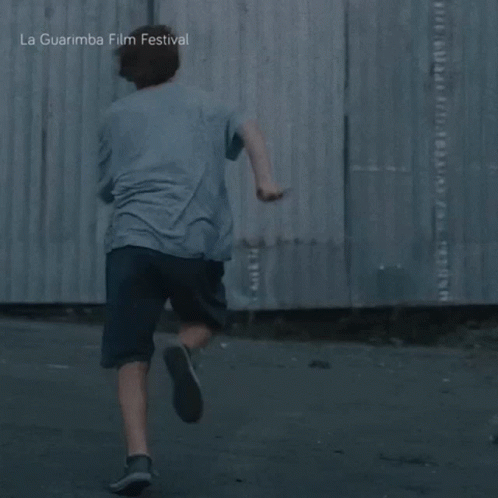 Young Boy Running in Front of La Guarimba Festival