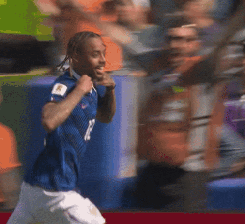 Young Boy Running in Number 29 Shirt