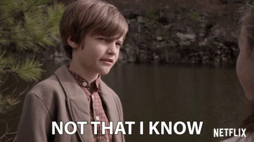 Young Boy Says Not That I Know in Front of Lake