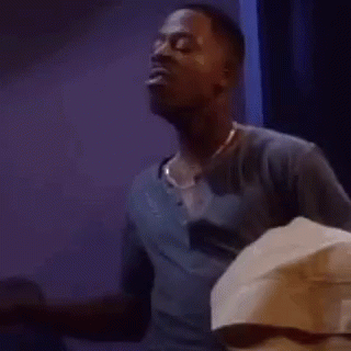 Young Boy Sitting In Chair Mouth Open GIF