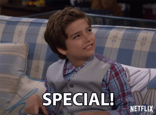 Young Boy Sitting on Couch with Special on Face
