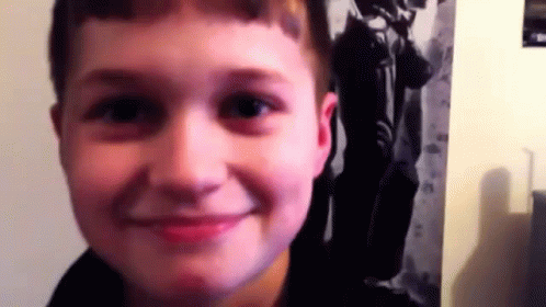 Young Boy Smiling Close Up