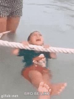 Young Boy Swimming in Pool Crying