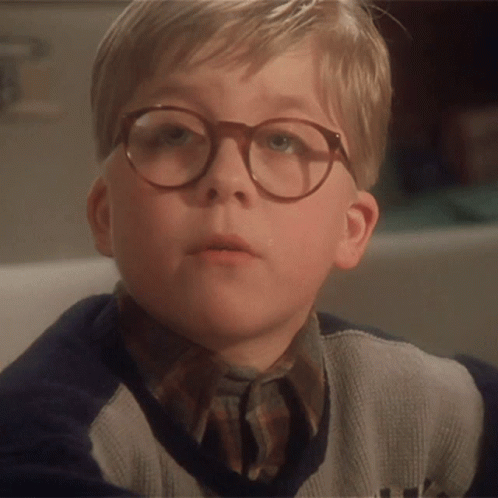 Young Boy With Glasses and Sweater With Letter A