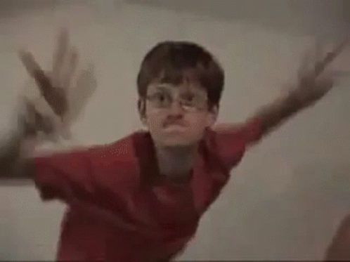 Young Boy With Glasses Crazy Dancing GIF