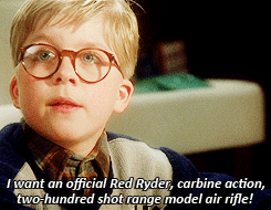 Young Boy With Glasses Says I Want an Official Red Ryder Carbine Action Two Hundred Shot Range Model Air Rifle