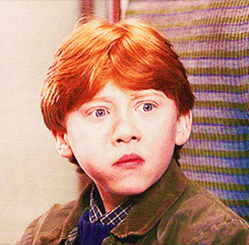 Young Boy with Red Hair Looking
