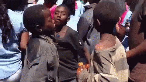 Young Boys Dancing One Holding Orange Juice GIF