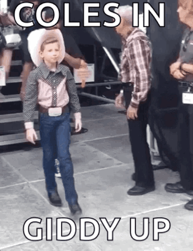 Young Cowboy Boy Walking on Stage