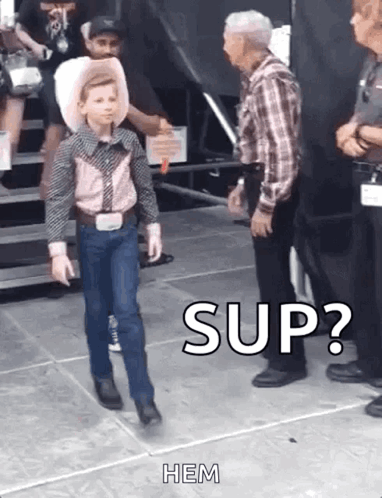 Young Cowboy Boy Walking Toward Man
