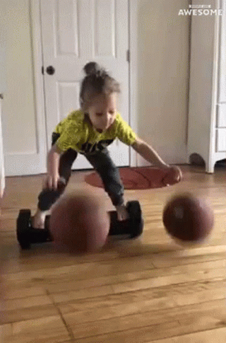 Young Girl Bouncing Basket Ball GIF