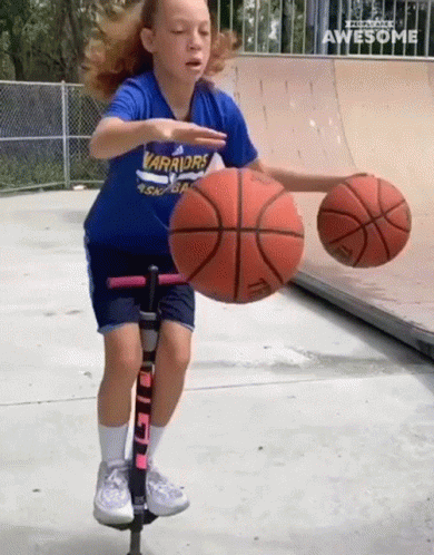 Young Girl Bouncing The Basket Ball GIF