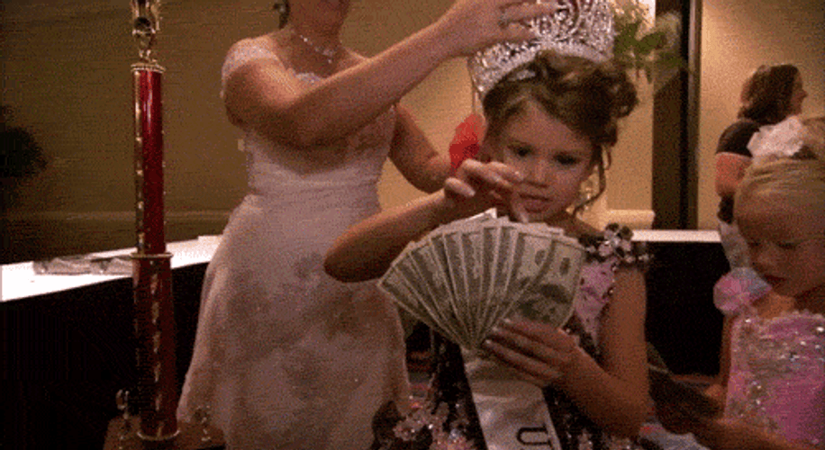 Young Girl Counting Her Money GIF