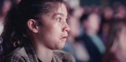Young Girl Crying Watching Movie in Theater