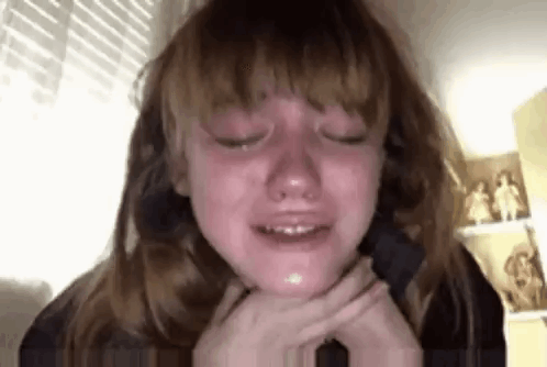 Young Girl Crying With Eyes Closed GIF