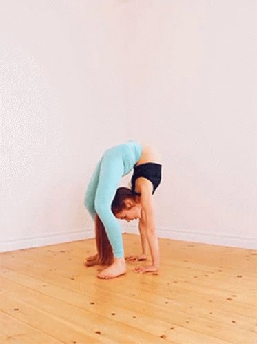 Young Girl Doing Yoga Pose GIF