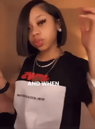 Young Girl In Black And White T-Shirt And Necklace GIF