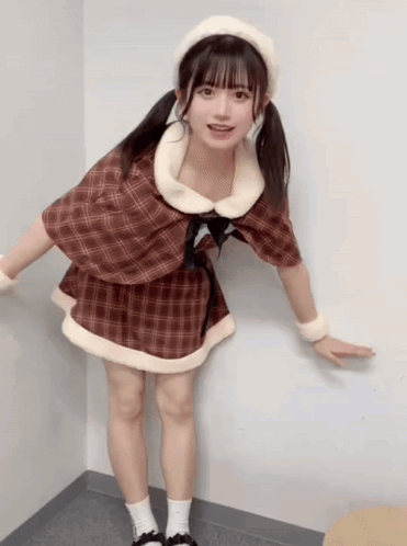 Young Girl Making Funny Face and Pointing Finger