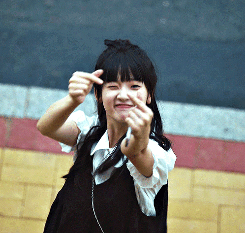 Young Girl Making Funny Face With Hands