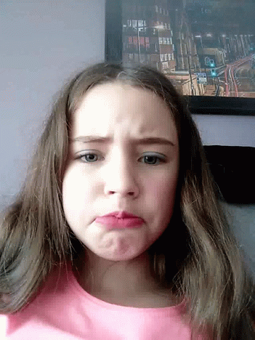Young Girl Making Funny Face with Mouth Open