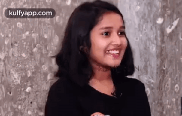 Young Girl Smiling at Camera