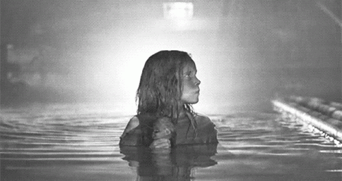 Young Girl Standing in Water