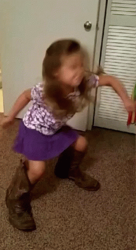 Young Girl Wearing Loose Boots GIF