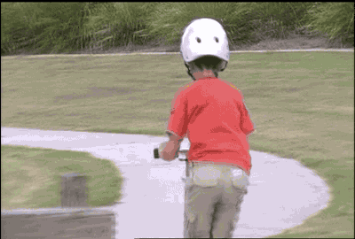 Young Kid Riding Scooter Mishap GIF