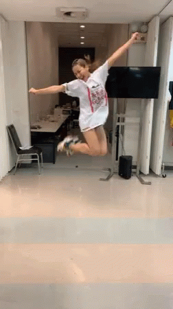 Young Lady Jumping Up And Down GIF
