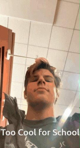 Young Man Adjusts Hair Too Cool For School GIF