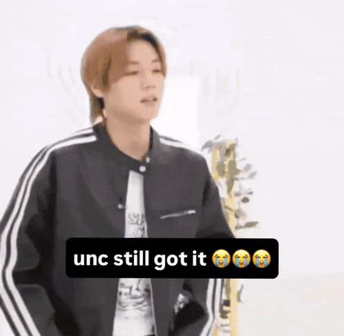 Young Man Black Jacket White Shirt UNC Still Got It