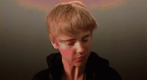 Young Man Close-Up With Eyes Closed GIF
