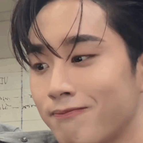 Young Man Close Up With Slight Smile GIF