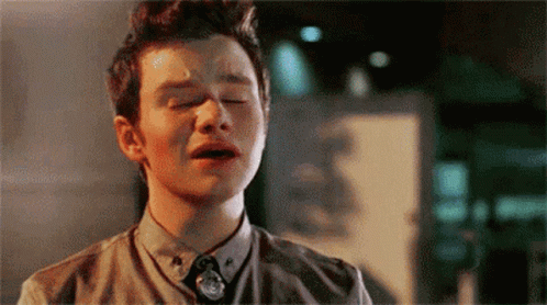 Young Man Crying Eyes Closed