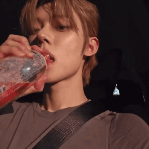 Young Man Drinking Coca Cola