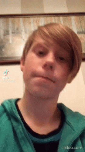 Young Man Green Jacket Black Shirt Funny Face