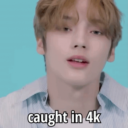 Young Man Holding Camera Saying Caught in 4K