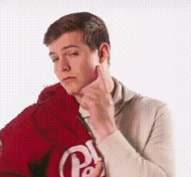 Young Man Holding Red Jacket Over Shoulder GIF