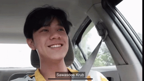 Young Man In Back Seat With Seat Belt Around Neck GIF