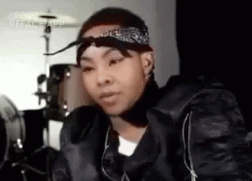Young Man In Bandana And Black Jacket At Drum Set GIF